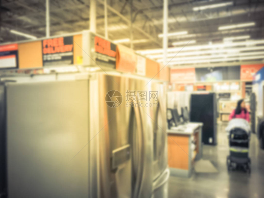 美庭改良店新冰箱的模糊运动列各种不锈钢法国式门相邻冷冻柜底层和顶层冷冻图片