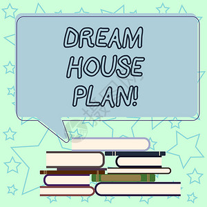 手写文字书写梦想之家计划概念意思是定义所有规格的施工作图不均匀堆的精装书和空白矩形背景图片