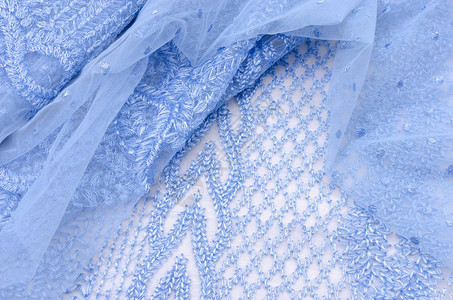 合成纤维蓝色带刺绣背景图片