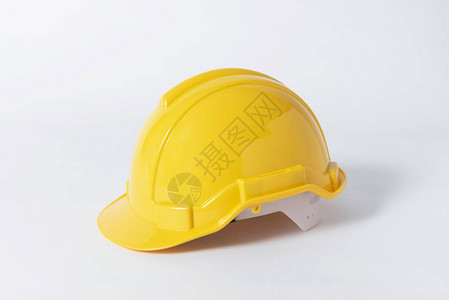 灰色背景的工程师塑料安全头盔图片
