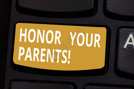 手写文字向你的父母致敬概念意味着高度尊重您的父母老人键盘意图创建计算机消息按背景图片