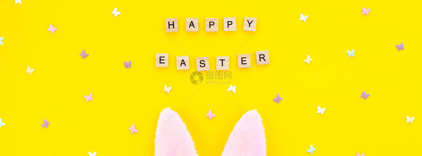 创意顶视图平躺假日组合复活节兔子短信在粗体黄纸背景复制空间模板复活节日季节图片