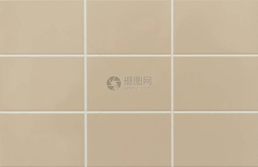 浴室墙上的米色瓷砖米色瓷砖的背景图片