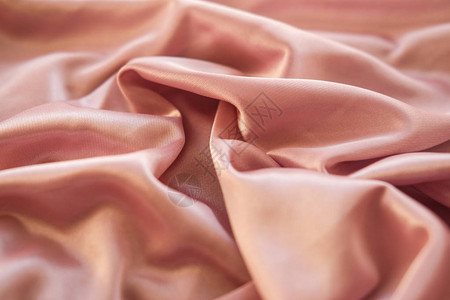 丝绸织物是布满波浪的粉红西丁织物是图片