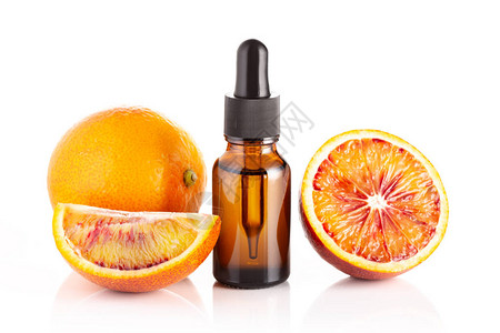白底孤立的橙色血液基本油类用于皮肤护图片