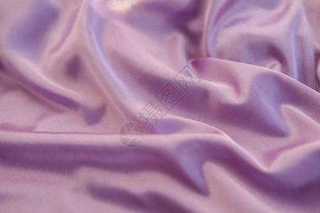 紫色的织物被布满了波浪图片