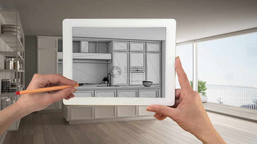 手握并用平板显示经典的白色厨房CAD草图背景中真正完成的内部图片