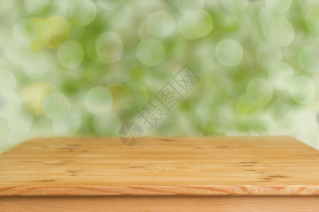 绿色背景模糊的木制背景图片