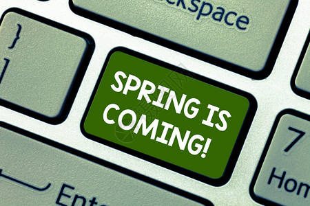 概念手写显示春天来了概念意指冬季后植被开始出现的季节键盘意图创建计算图片