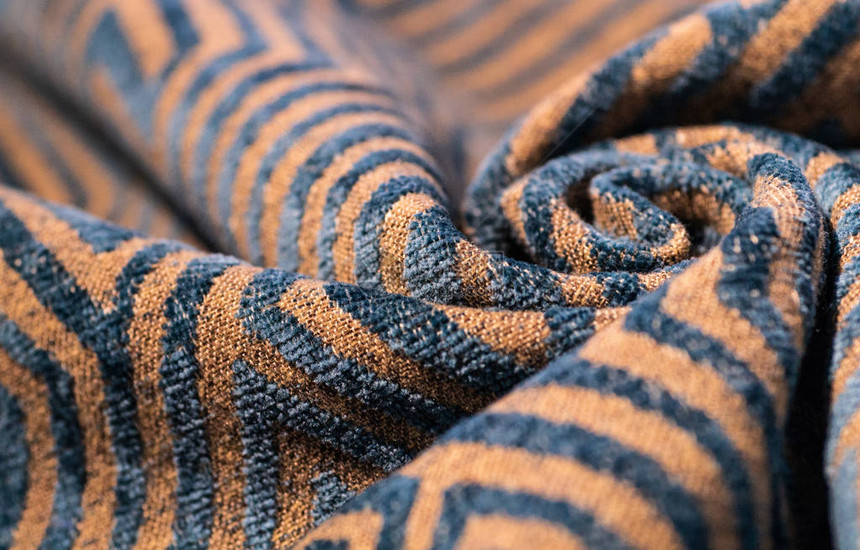 从消光织物纹理背景丝绸织物纹理纺织工业背景与模糊彩色棉织物的多色布目录图片