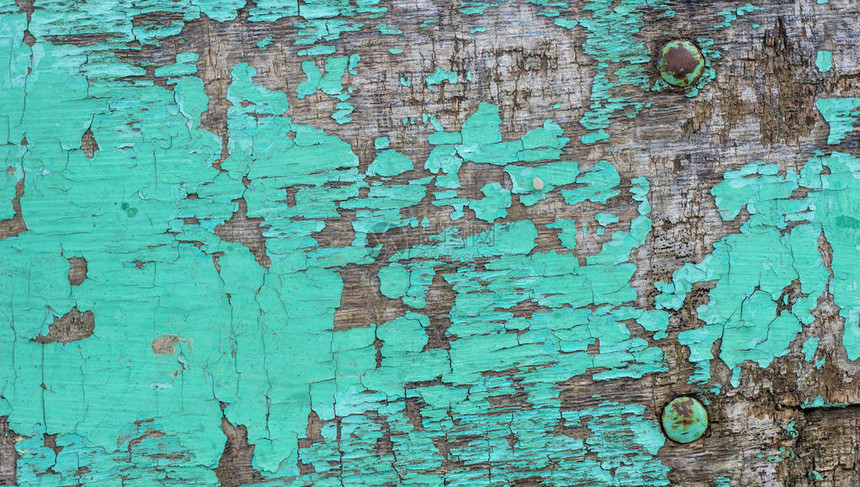 绿色颜风化涂料和刮痕破碎的古老木制质图片