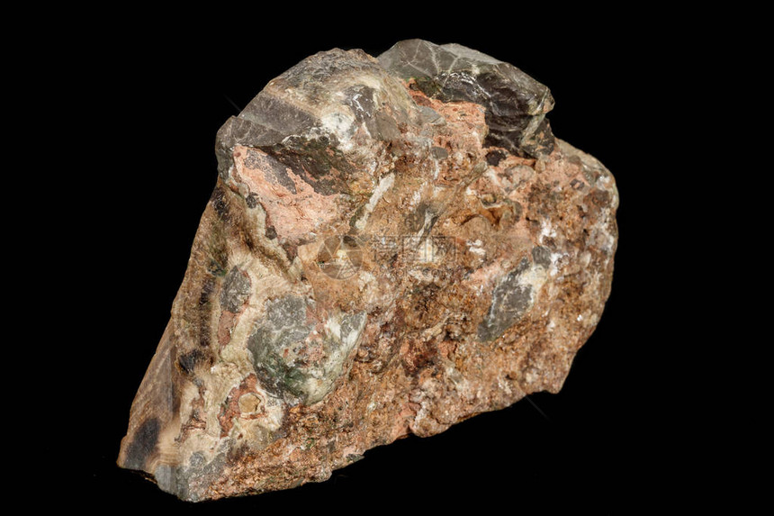 黑色背景上的宏观石矿物缟玛瑙大理石特写图片