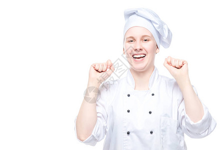 穿着服装的喜乐厨师在胜利中欢欣快乐图片