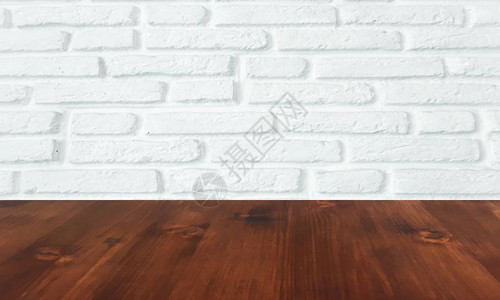 棕色木桌与白色砖墙纹理背景图片