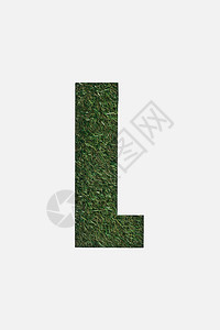 以白色隔离的绿草背景上的L字母背景图片