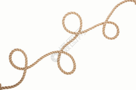 长棕色和黄麻绳条卷背景图片