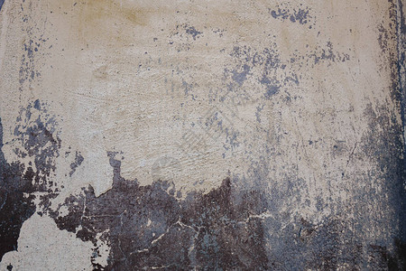 有摇欲坠的石膏纹理背景的旧墙图片