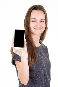 展示空白智能手机屏幕手机的年轻女青年图片
