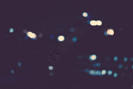 大都市夜间灯光模糊背景图片