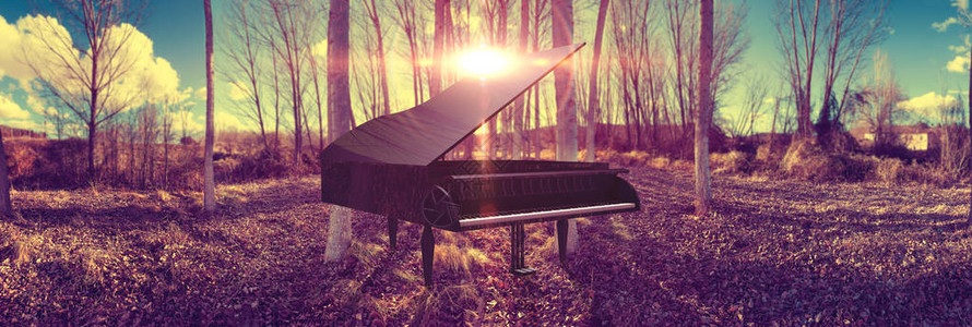 超现实的梦幻日落和黑色三角钢琴图片