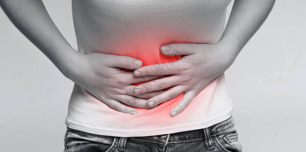 患有腹部疼痛腹泻单色相片与红酸带的单图片