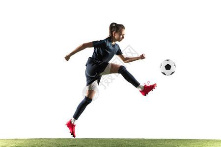 年轻的女足球或足球运动员图片