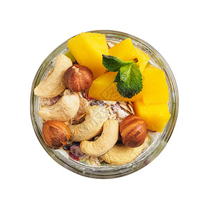 加椰子牛奶芒果和坚果的罐子里的Chia种子布图片