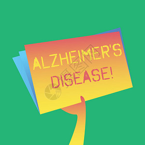 显示阿尔茨海默病的文字符号是疾病商业照片展示了老年手握和提高空白彩色文件夹内出现的背景图片