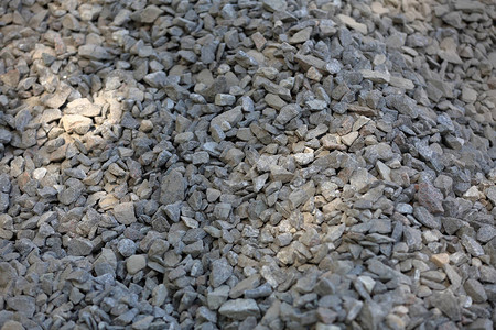 一堆建筑鹅卵石和砾石的灰色纹理表面图片