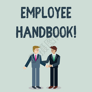 显示员工手册的书写笔记的商业理念是公司的规章制度和政策商人通过握手相图片