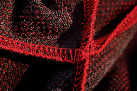 红色运动服封闭顶端视图内部接缝和关节可透气的编织服装背景图片
