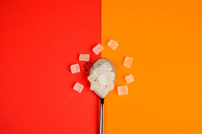橙色和红色背景的糖取图片
