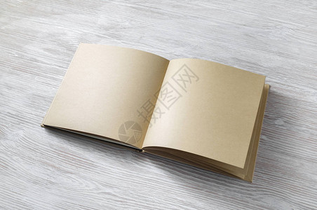 空白笔记本或光木背景的Kraft纸图片