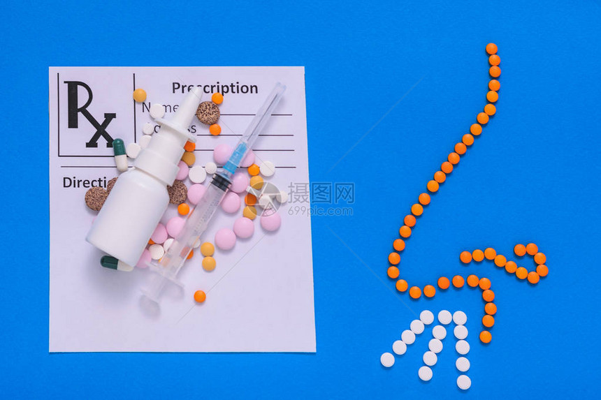 医生预约表上写着药品和蓝色背景的药片鼻孔图象图片