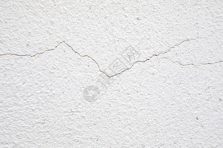 水泥砖表面的白墙裂缝图片