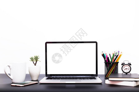 笔记本电脑背景带笔记本电脑的工作区家庭或工作室办公室的办公用品小工具图片