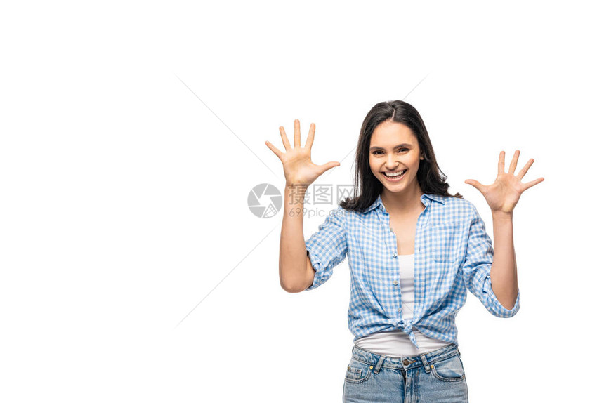 快乐的女孩用张开的手掌做手势图片