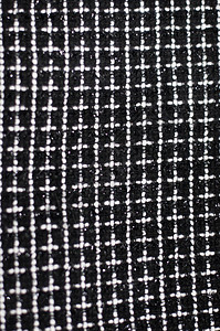 织物纺织材料编织白色黑布的背景图片