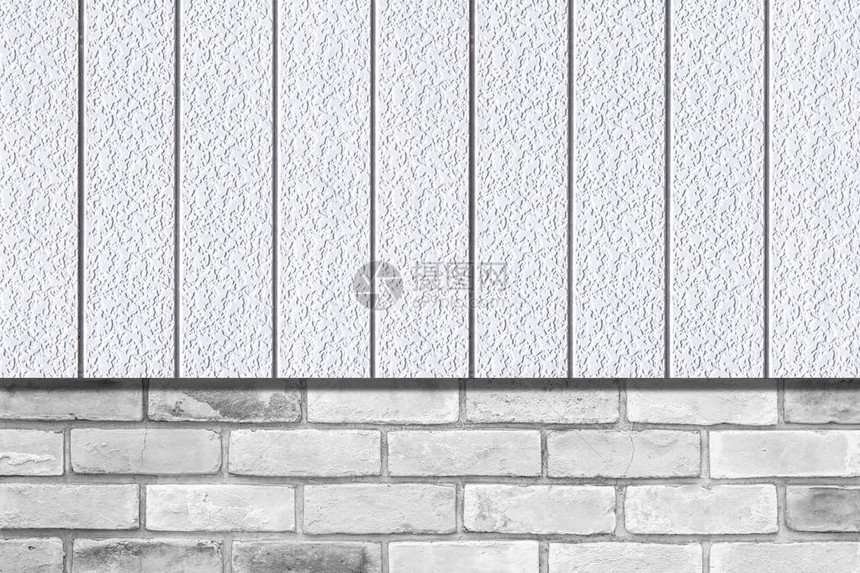 白色金属栅栏和砖墙纹理和背景图片