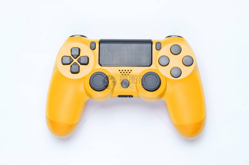灰色背景的现代黄色游戏板joystickT图片