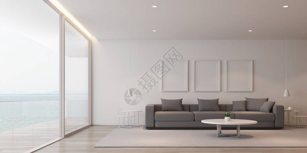 现代豪华的透视与灰色沙发和白色相框和餐桌设置在海景背图片