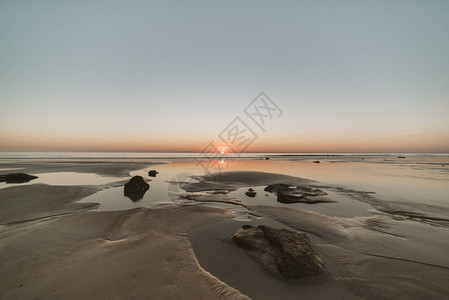 凯布尔海滩的黄金时段日落图片