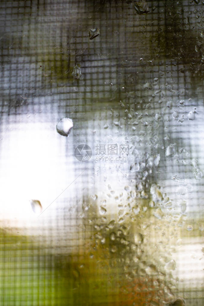 散景雨滴散景绿色花园背景中上的水滴模糊蚊帐丝网模糊特写和微距拍摄选择聚焦关于早图片