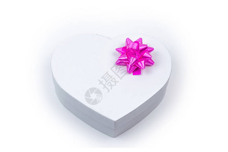 白色的心形礼物盒粉红色的弓用于节日圣诞节感谢上天图片