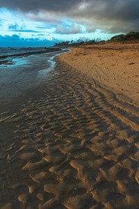 日出时在Waipouli的沙滩夏威背景图片