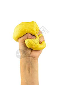 白色背景的黄色粘液拳头儿童Zolirovanye球图片