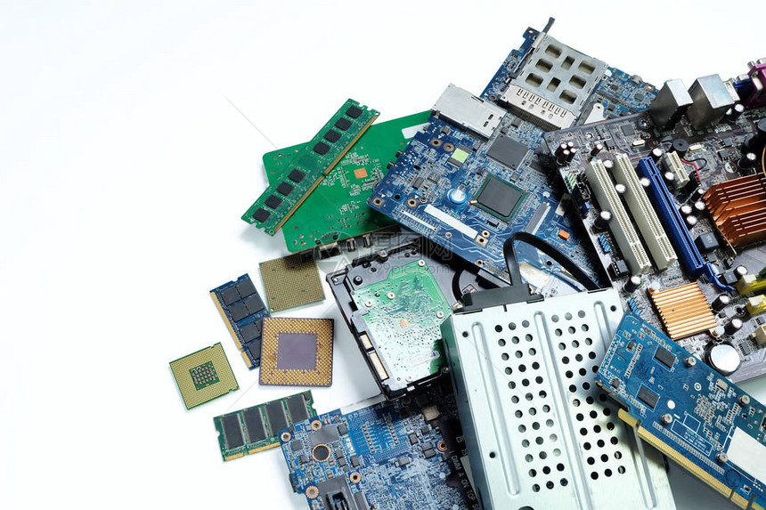 一堆电子垃圾主板计算机和cpu微芯片电子设备白色背景的印刷电路板电子垃圾是环境概念的问题图片