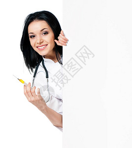 有注射器的愉快的年轻女医生图片