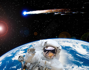 宁航员宇宙航员挥舞彗星这幅由美国航天局提供背景