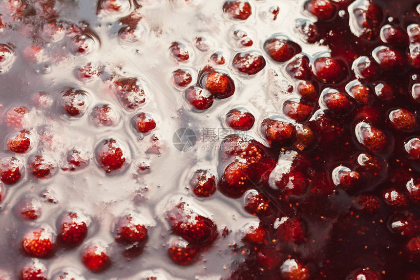草莓酱特写的美丽眩光质感食物背景图片
